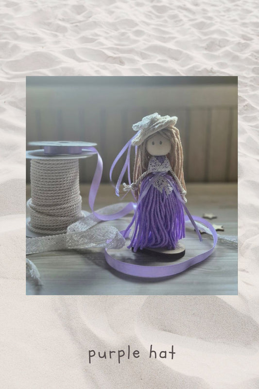 Yarn doll- purple hat