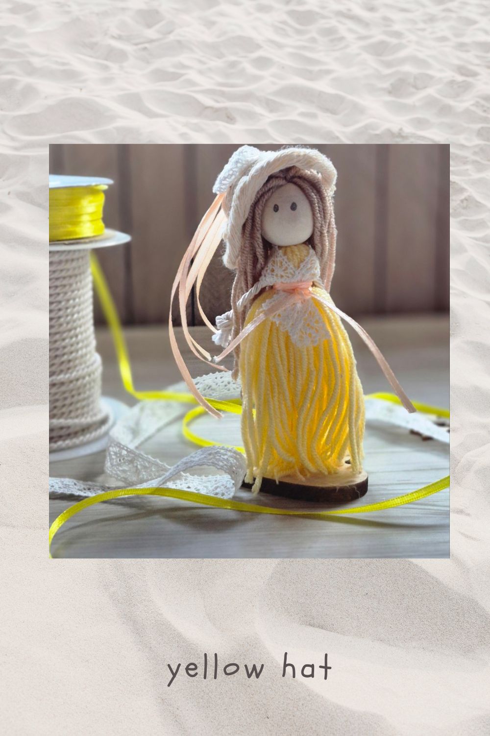 Yarn doll- yellow hat