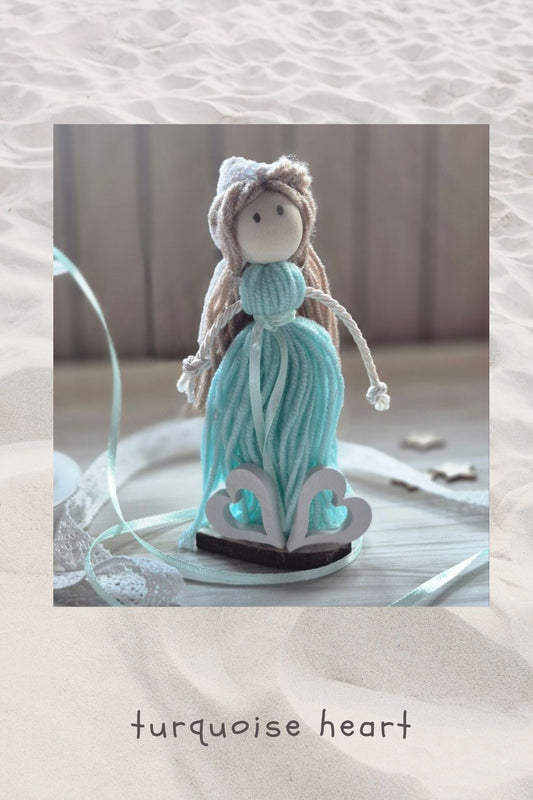 Yarn doll- turquoise heart