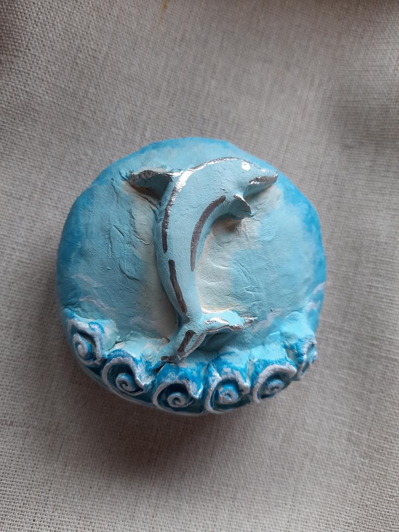 Handmade clay pebble- dolphin