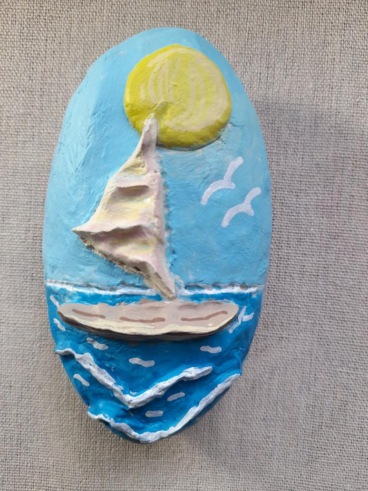 Handmade clay pebble- sailing